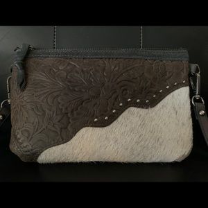 Leather and cowhide clutch